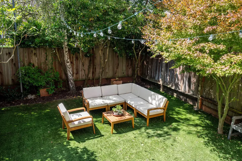Private rear garden with lounge seating