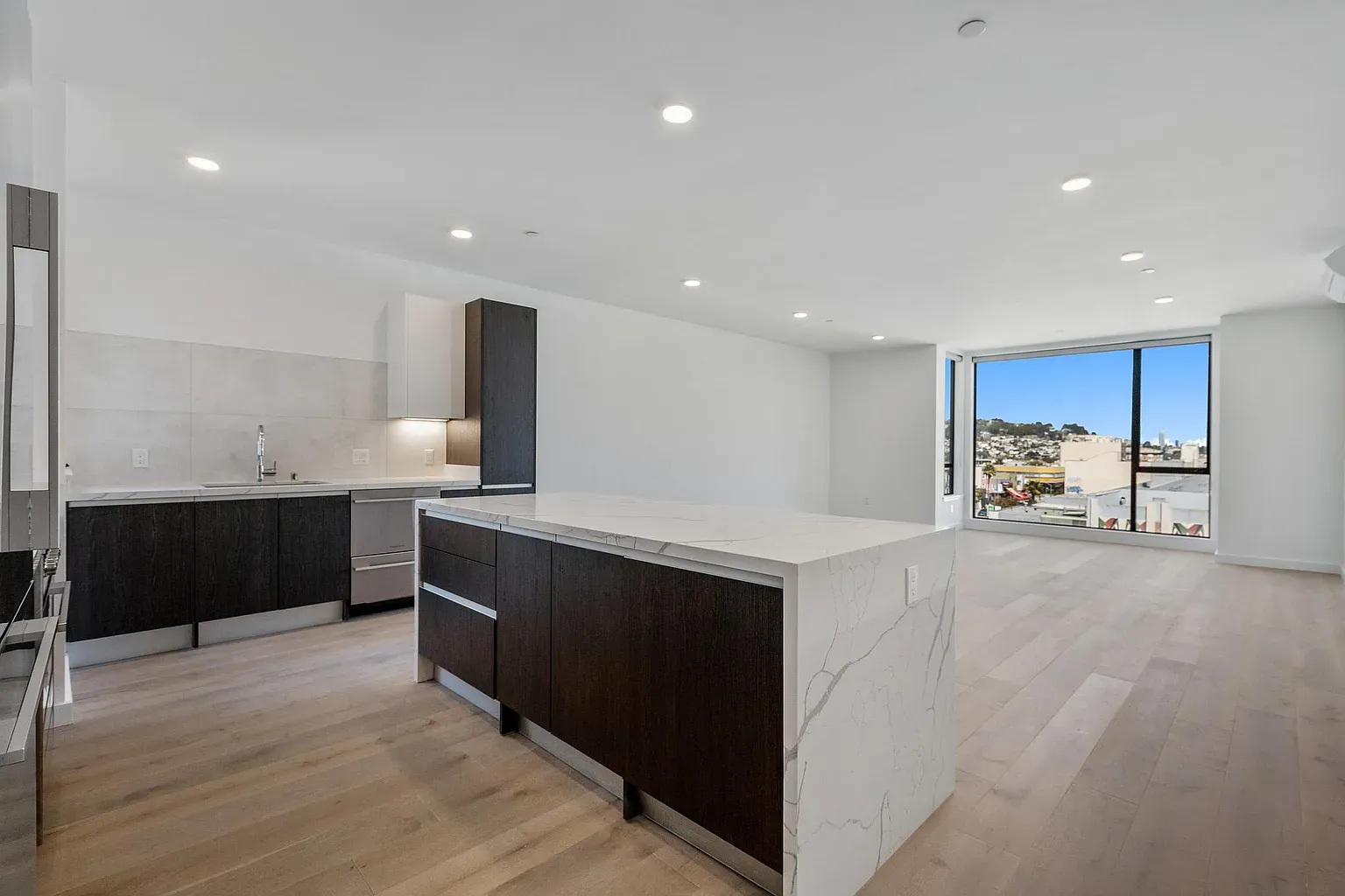 Open living and kitchen space at Russia House with city views