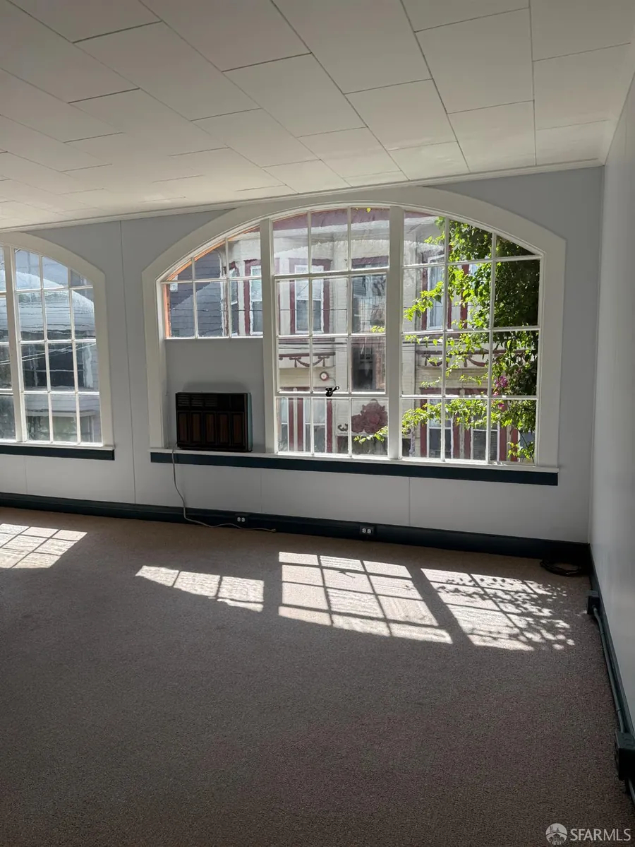 Upper floor with arched windows