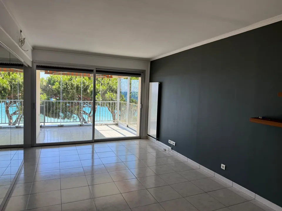Living room opening onto the sea-view terrace