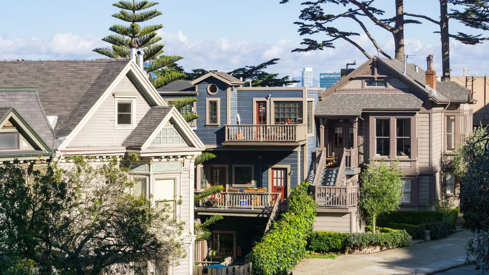 Victorian and Craftsman-style houses with gardens and mature trees in San Francisco